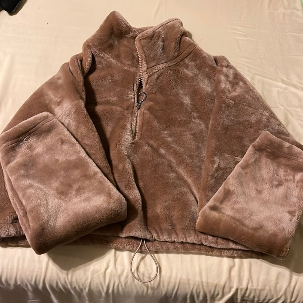 Mandee teddy tan jacket. It is in a crop top style